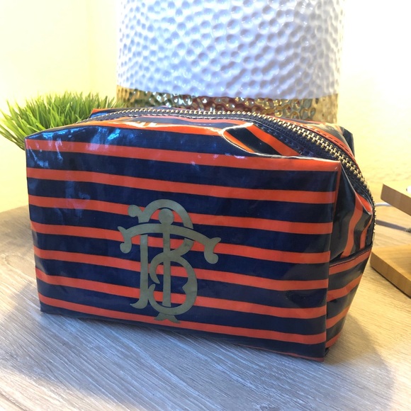 Tory Burch Handbags - Small Tory Burch zip up makeup bag Navy & orange